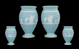 Victorian Period Wedgwood Pair of Powder Blue Jasper Ware Vases decorated with raised, applied,