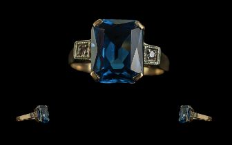 Ladies 14ct Gold Pleasing Blue Topaz and Diamond Set Ring. Marked 14ct to Shank. The Faceted Topaz