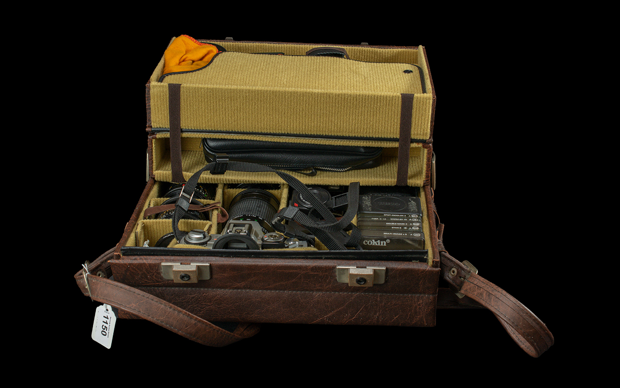 Minolta Camera, in fitted brown leather case, complete with lenses and accessories. - Image 2 of 3