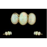 Antique Period Pleasing 18ct Gold 3 Stone Opal Set Ring, circa 1900. The well-matched oval shaped