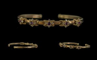 Edwardian Period 1901-1910 Attractive 9ct Gold Amethyst & Diamond Set Bangle. The five Amethyst