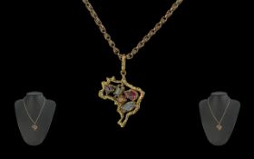 Early 20th Century 18ct Gold Gem Set Pendant In the Form of Australia with Attached 18ct Gold Chain.