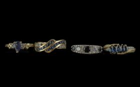 Four 9ct Gold Dress Rings, set with blue