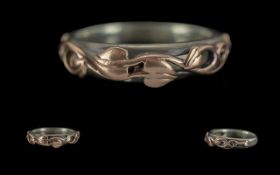 Clogau - Welsh Gold and Sterling Silver Early Band Ring. Scrolling Tulips Design to Outer Band.