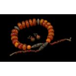 Copal Resin Amber Necklace & Earrings, comprising a large beaded necklace with silver tone bead