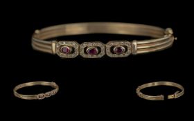 Antique Period Ladies 9ct Gold Ruby and Diamond Set Hinged Bangle, full hallmark to interior of