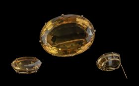 Antique Period Impressive 9ct Gold Citrine Set Brooch of large proportions and of oval form,