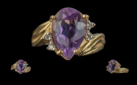 Ladies 14ct Gold Amethyst and Diamond Set Dress Ring of Pleasing Design. Marked 14ct to Interior