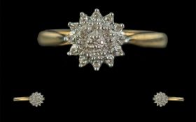 Ladies 9ct Gold Diamond Cluster Dress Ring. Stamped to Shank. Ring Size N. Weight 1.7 grams.