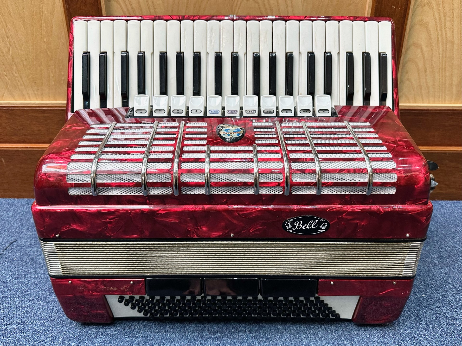 Bell Piano Accordion, in fully fitted box, case in red marble effect.
