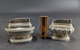 Two Ronson Vintage Table Lighters, 'Queen Anne' and 'Crown', together with a Ronson slim line
