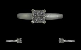 Ladies 18ct White Gold Diamond Set Ring of Contemporary Design. The Four Princes Cut Diamonds of