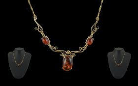 Ladies Superb and Pleasing 15ct Gold Amber Set Necklace, marked 585 - 14ct, of pleasing openwork