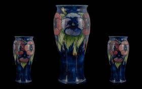 Moorcroft Pleasing Large Tube lined 'Blue Pansy' Vase, circa 1920s, script mark for William