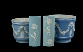Two Wedgwood Blue Jasper Planters, classical pattern, measure 6'' and 5'' high, together with two