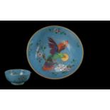 Cloisonne Bowl by England & Sons, depicting a flying parrot and blossom. Base colour blue, with