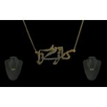 Gold on Silver Italian Necklace with stylised dove and heart design suspended on a box chain. Marked