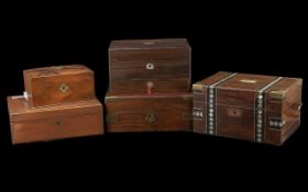A Collection of Five Hinged Victorian Travelling Boxes all of typical form, some with slopes. In