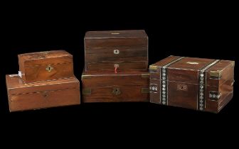 A Collection of Five Hinged Victorian Travelling Boxes all of typical form, some with slopes. In