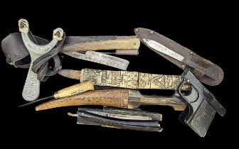 Collection of Items comprising four knives, two cut throat razors, catapult and starting pistol.