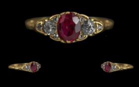 Ladies 18ct Gold Attractive Ruby and Diamond Set Ring. The Central Faceted Rubies of Excellent
