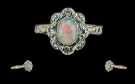 Antique Period Attractive and Petite 18ct Gold Opal and Diamond Set Ring of pleasing design,