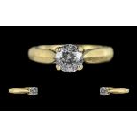 18ct Gold Excellent Diamond Set Ring. Full Hallmark to Interior of Shank. The Central Brilliant