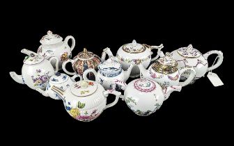 Collection of V & A Museum Teapots, designs include Venice, Tournay, Mennecy, Furstenberg, Hochst,