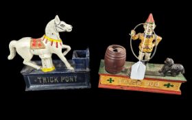 Two Vintage Cast Iron Money Boxes, one in the form of a carousel horse 'Trick Pony' and one in the
