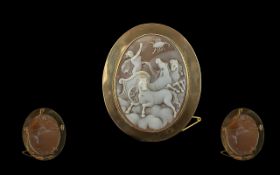 A Large and Impressive 9ct Gold Oval Mounted Shell Cameo Brooch, The Raised Carving Depicts a