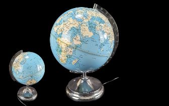 Light up Globe, raised on a chrome base, working at time of cataloguing. Measures 16'' high.