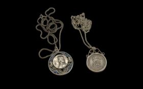 Two Silver Pendants on Chains, comprising a Joan of Art circular pendant, and a George V mounted