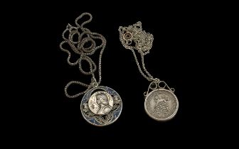 Two Silver Pendants on Chains, comprising a Joan of Art circular pendant, and a George V mounted