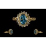 Ladies Fine and attractive 18ct Gold Blue Topaz and Diamond Set Cluster Ring - Marked 750 To Shank.