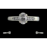 Ladies 18ct White Gold Diamond Set Dress Ring - Of Excellent Proportions. The Central Oval Shaped