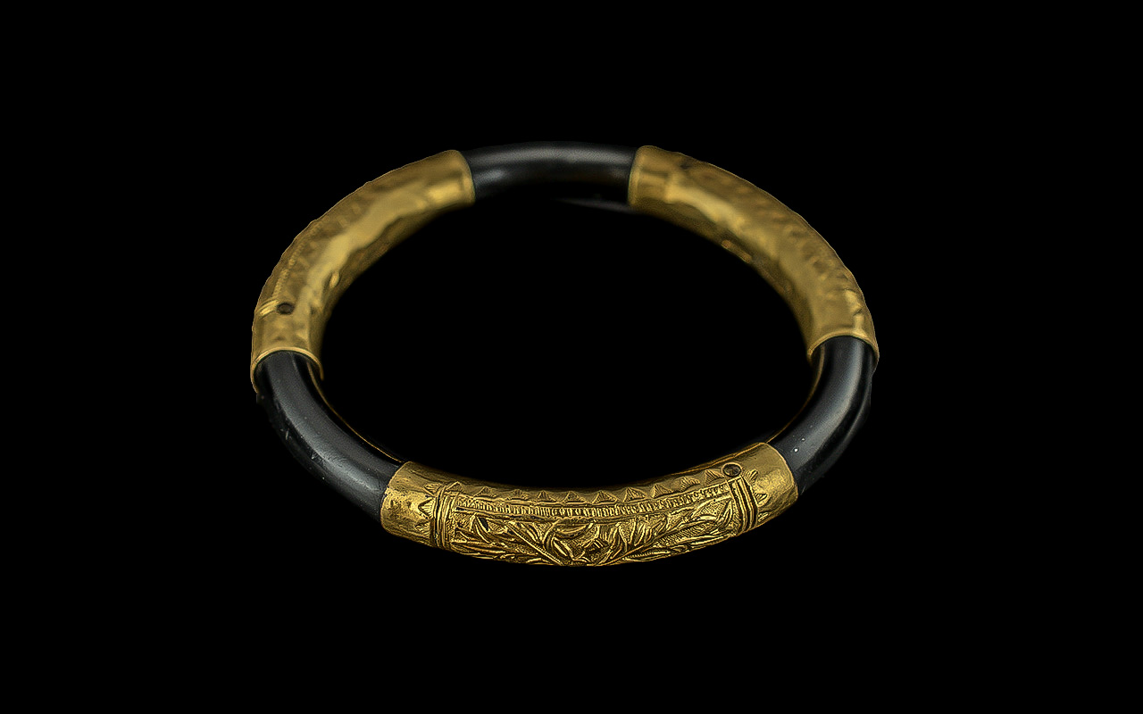 Chinese Early 20th Century 21ct Gold Banded Bangle with embossed naturalistic floral design,