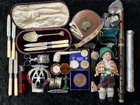 An Assortment of Collectables to include a vintage clarinet, an old doll,a vintage tape measure, odd