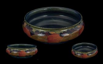 William Moorcroft Large Ochre 'Pomegranate' Design Bowl, circa 1920s, diameter 8 inches (20cms),