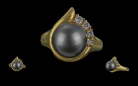 Ladies Pleasing Quality 18ct Gold Black Pearl and Diamond Set Ring, marked 750 - 18ct to interior of