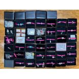 Collection of Boxed Avon 'Treasure Beads', 46 boxed charms, together with some loose, various charms
