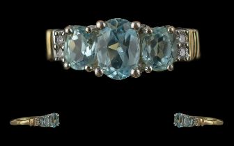 Ladies 14ct Gold Aquamarine and Diamond Set Dress Ring. Marked to Interior of Shank. The Faceted