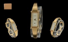 Gucci Ladies Gold Plated - Quartz Bangle Watch. Model No 1500. Signed to Clasp, Dial and Back Cover.