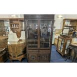 Chinese Style Cherrywood Display Cabinet, glazed doors and sides, above two drawers and storage