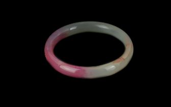 Lavender Jade Bangle, in shades of pale green and pink.
