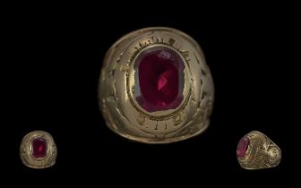 10ct Gold Heavy Single Stone Ruby Set College Ring, full marks to shank, ruby with edge knocks but