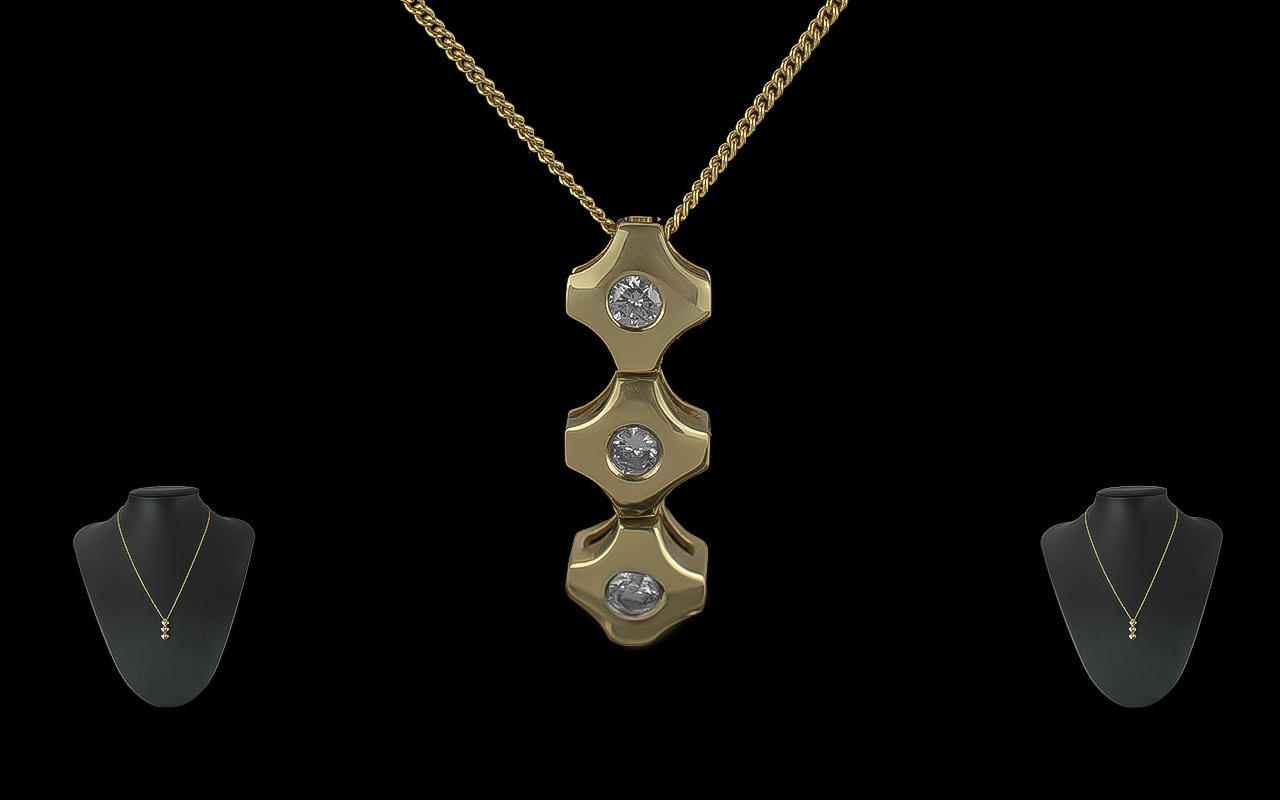 Ladies Contemporary Design Three Stone Diamond Set Pendant Drop with attached 18ct gold chain,