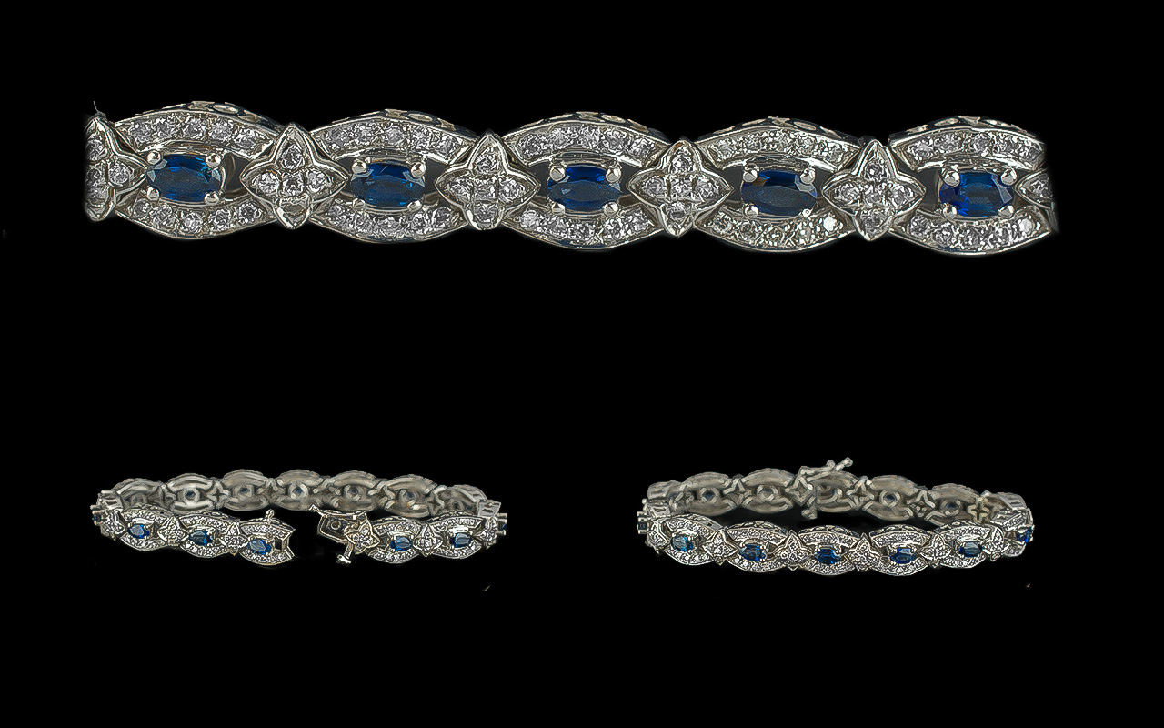 Ladies - Attractive 14ct White Gold Diamond and Sapphire Set Bracelet. Marked 14ct. The Blue