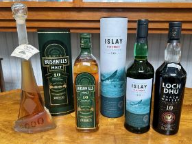 Three Bottles of Single Malt Whisky, comprising Islay Malt 10 year old, Bushmills Malt 10 years old,