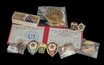 Mixed Lot to include a Cuban Airborne Troops Jump Badge, a group of five Russian Excellence