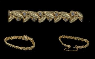 Ladies Pleasing Quality 14ct Gold Diamond Set Bracelet of excellent design, the diamonds of good